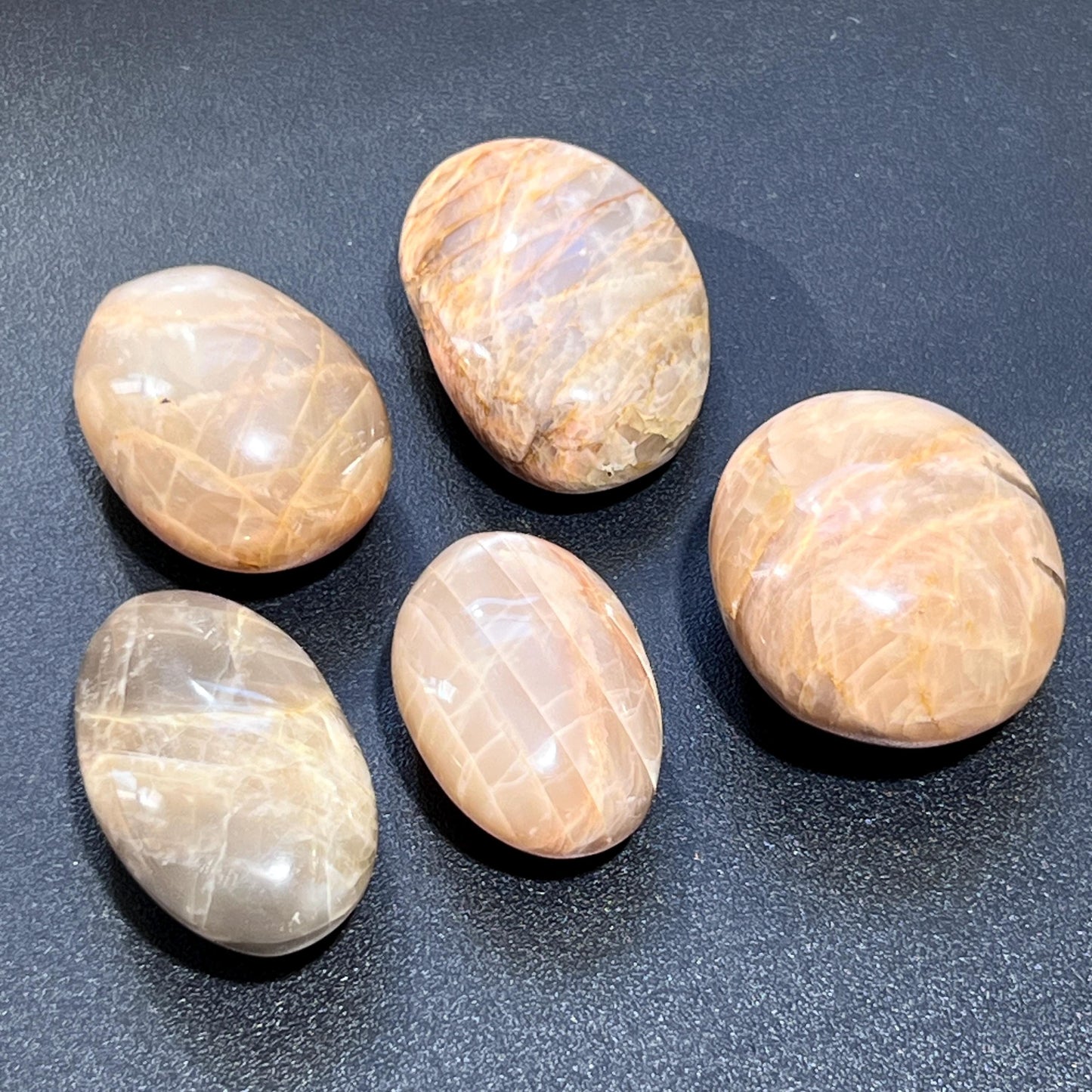 Peach Moonstone Flashy Palm Stone Carving