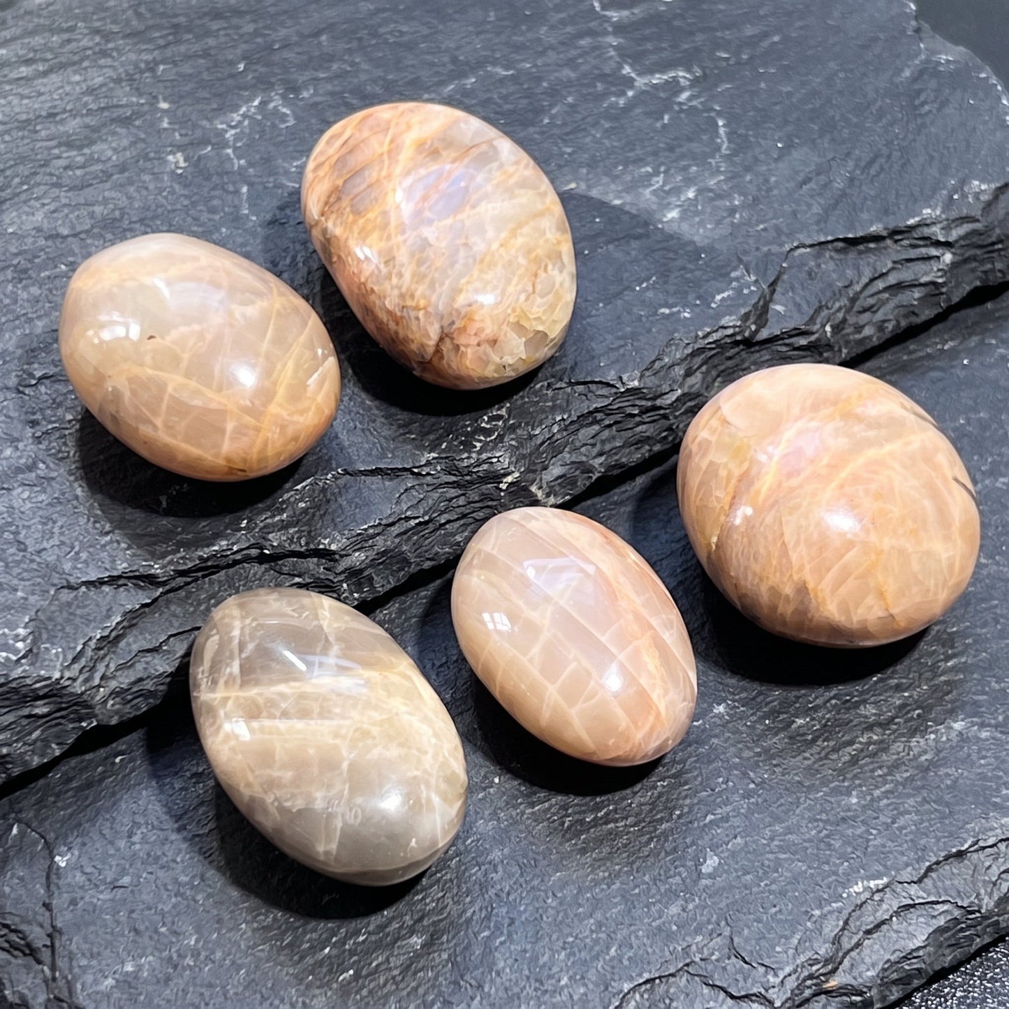 Peach Moonstone Flashy Palm Stone Carving