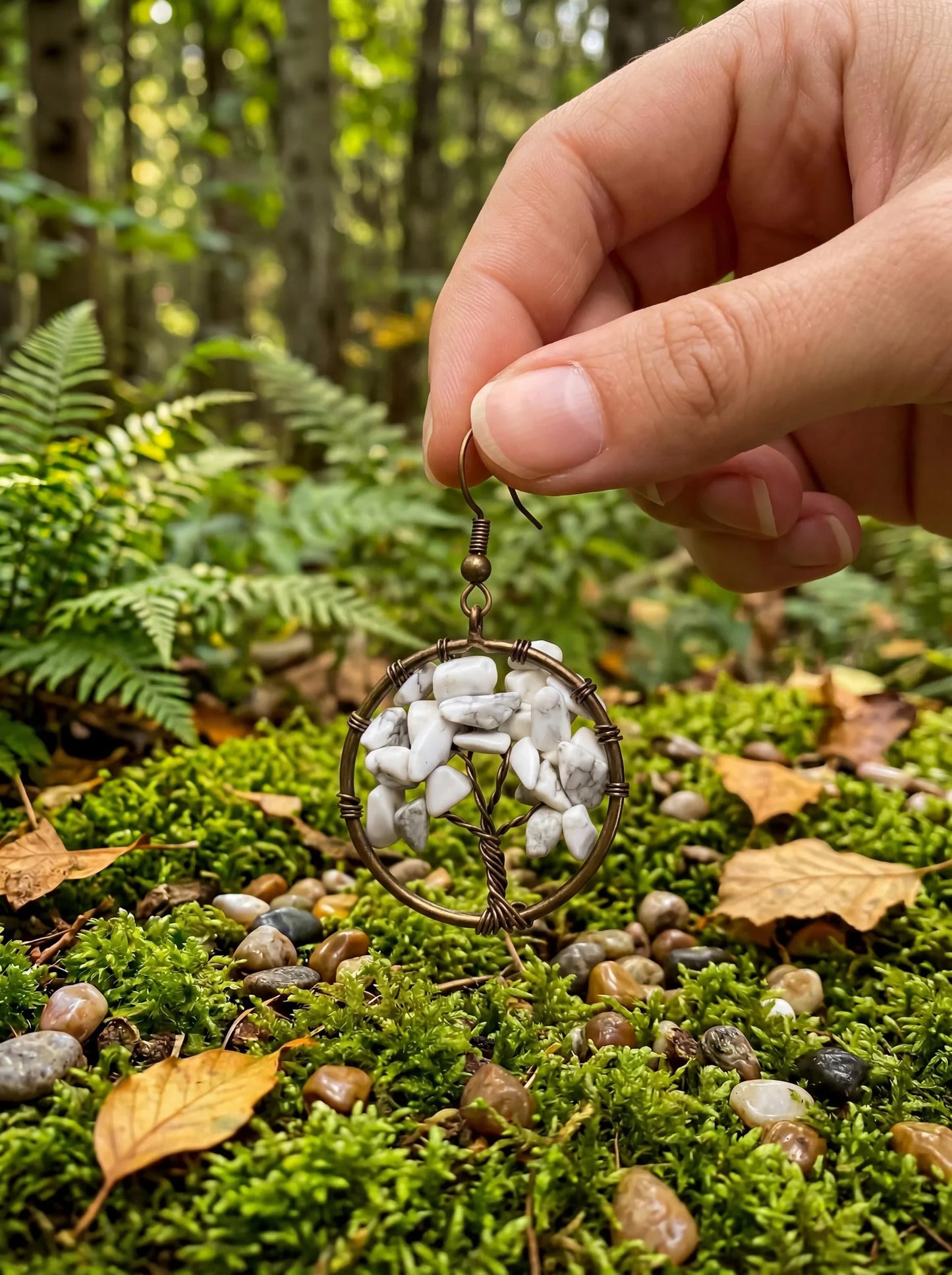 Wire-wrapped tree of life earring with white howlite chips, held in forest setting