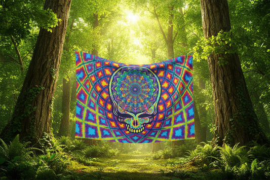 a tapestry hanging between two trees that has a steal your mind skull on it